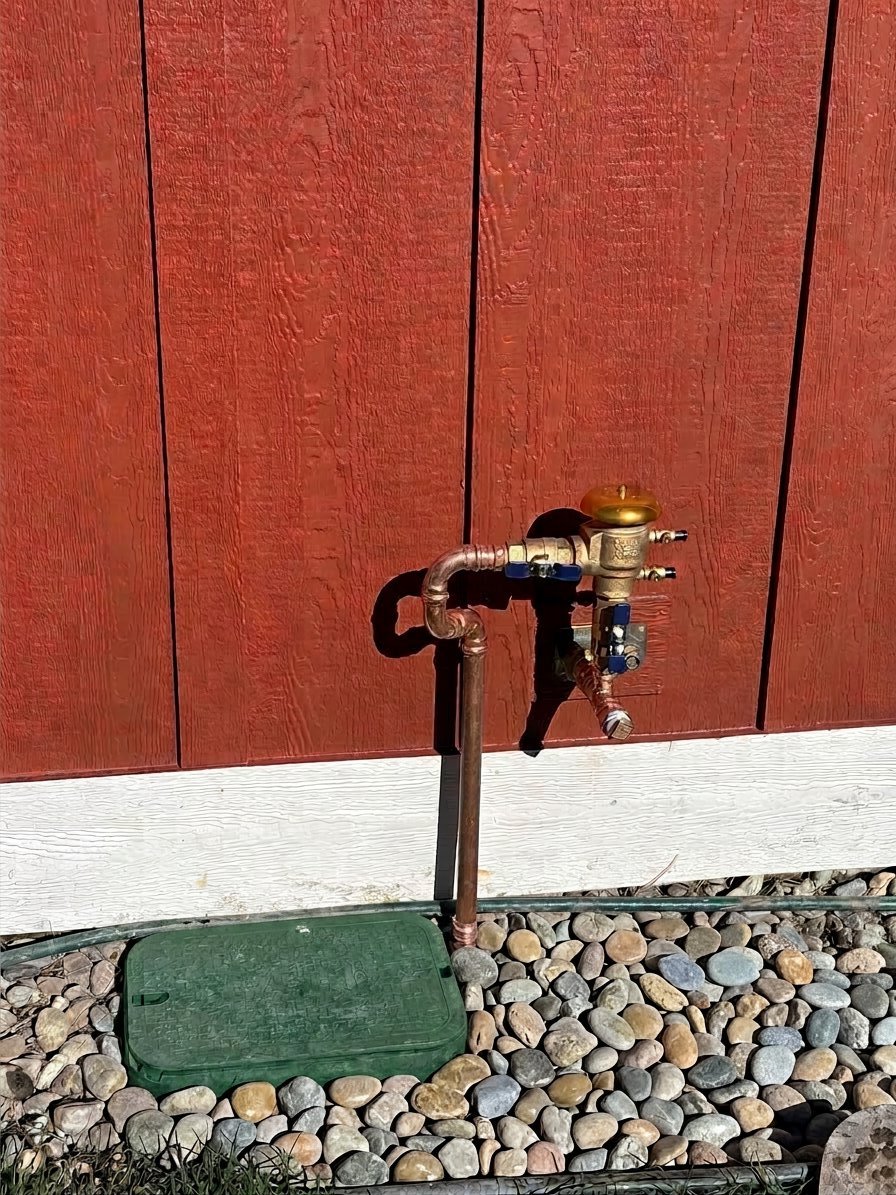 Total Care Montana's clean copper irrigation backflow installation — the gold standard